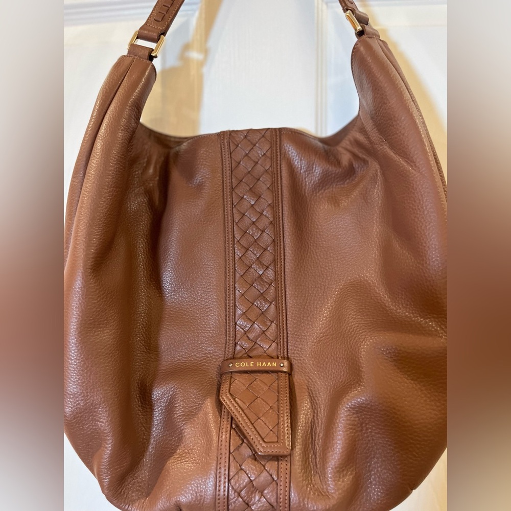 Cole Haan Brown leather shoulder bag with gold accents. Like new condition